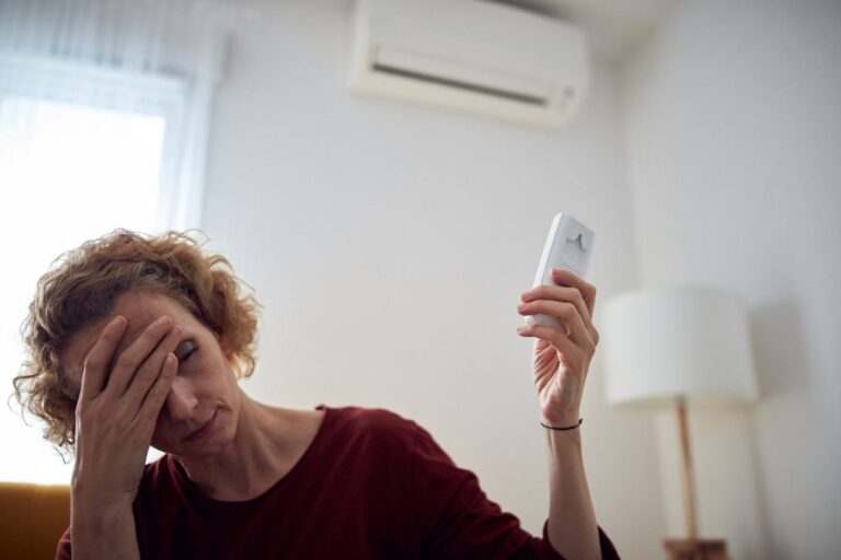 ac blowing warm air